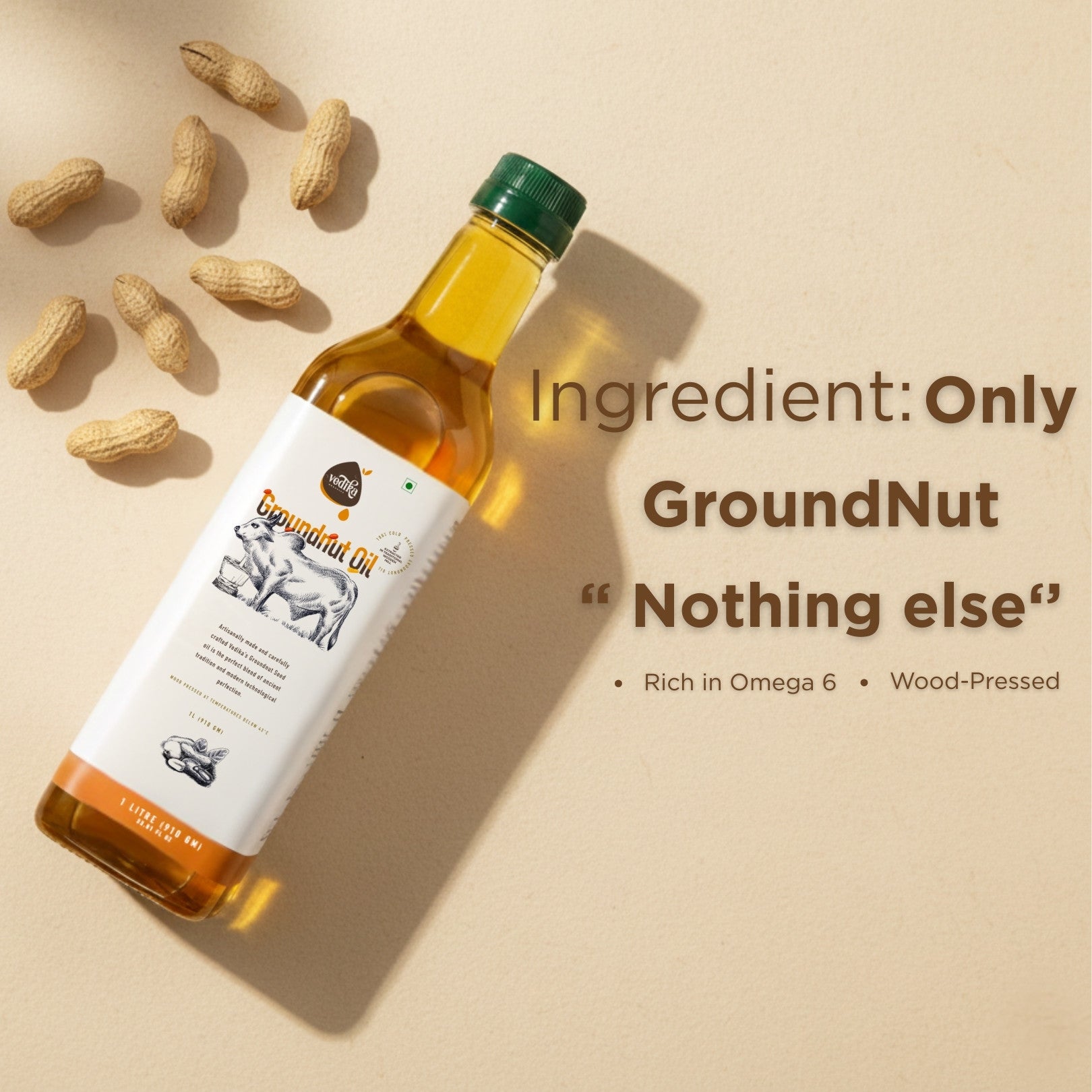 Pure groundnut oil bottle with raw peanuts showing natural ingredients - Vedika Organics